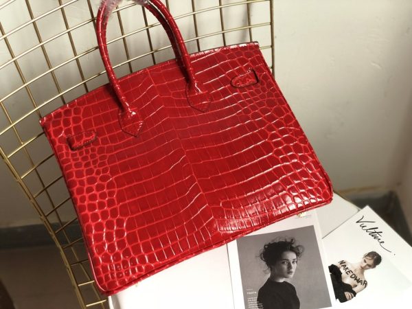 H A SHINY SANGUINE POROSUS CROCODILE BIRKIN 30 WITH GOLD HARDWARE RED 30CM